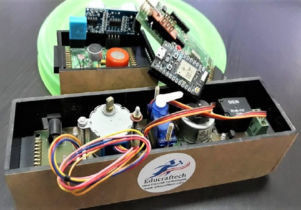 IoT research kit with microcontroller, sensors, and modules in a case